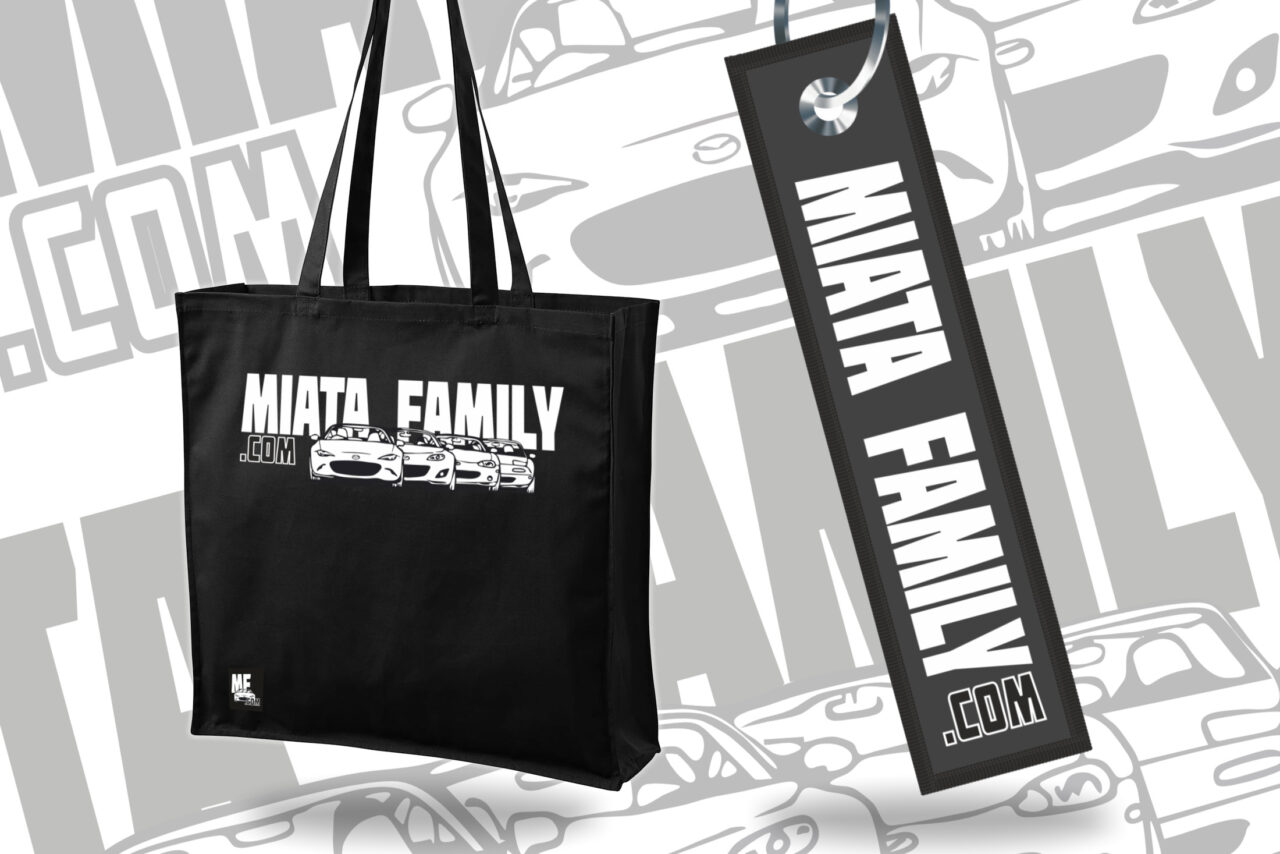 Grab MX-5 Accessories like black MiataFamily.com tote bag featuring a white logo with a Mazda Miata car illustration, perfect for Mazda Miata enthusiasts and car events.