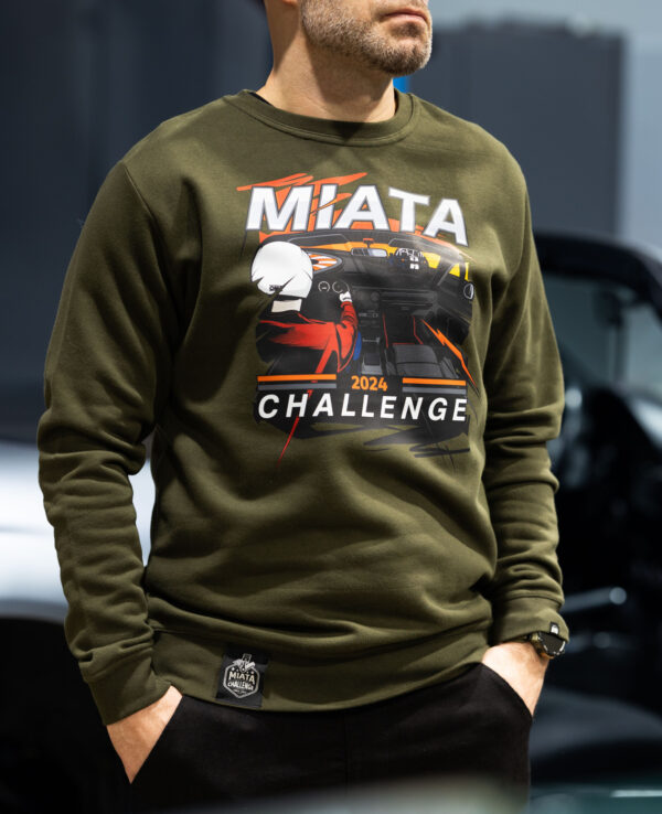 High-quality Miata Challenge 2024 sweatshirt featuring a racing car graphic, perfect for Miata enthusiasts and car event participants.